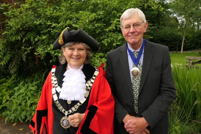 A photo of councillors Debo Sellis, the new mayor of West Devon, dressed in the West Devon mayoral regalia, and Cllr Paul Vachon, the new deputy mayor of West Devon.