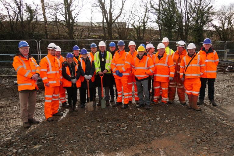 Dignitaries and representatives at the Okehampton Interchange turf cutting event.