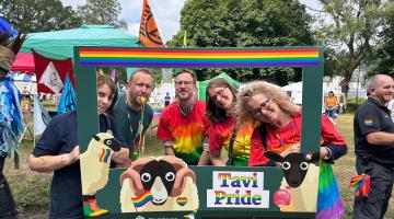 Members of the West Devon Community Development Team at Tavistock Pride, held in the summer of 2024.