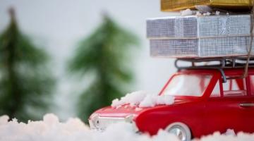 a red car with gifts on top