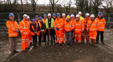 Dignitaries and representatives at the Okehampton Interchange turf cutting event.